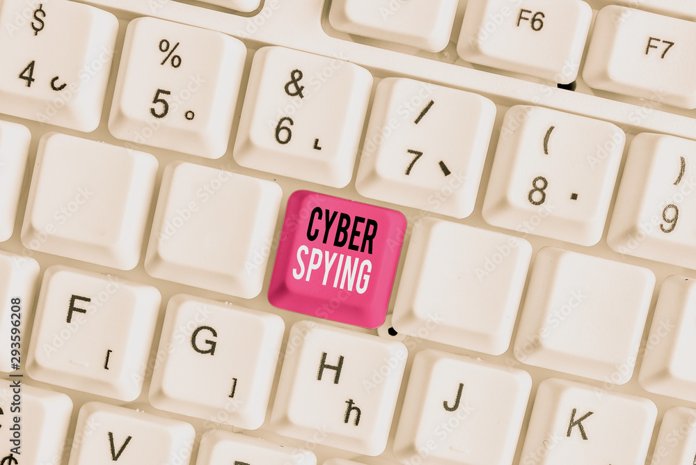 Handwriting text writing Cyber Spying. Conceptual photo form of cyber attack that steals classified or sensitive data White pc keyboard with empty note paper above white background key copy space Handwriting text writing Cyber Spying. Conceptual photo form of cyber attack that steals classified or sensitive data White pc keyboard with empty note paper above white background key copy space