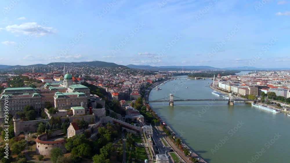 Budapest, Hungary, aerial view of Budapest cityscape showing Castle Hill and the Danube river by day during fall season. Budapest, Hungary, aerial view of Budapest cityscape showing Castle Hill and the Danube river by day during fall season.