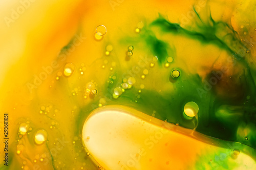 Yellow and green dyes in water and oil