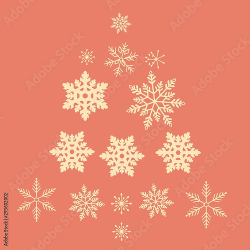 Christmas tree of yellow snowflakes on a coral background