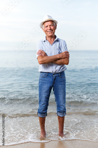 Portrait of smiling mature man near the sea