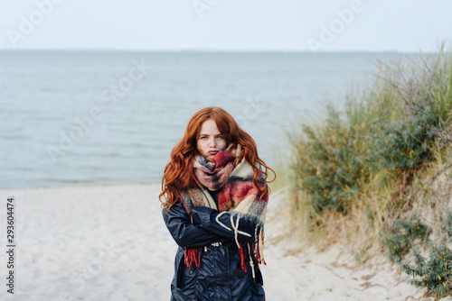 Fotografija Unimpressed young woman shivering in the cold