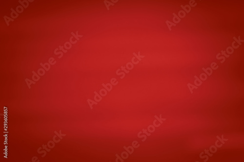 Blur red abstract background. Defocused strokes rays stripes. Smeared colored glow.