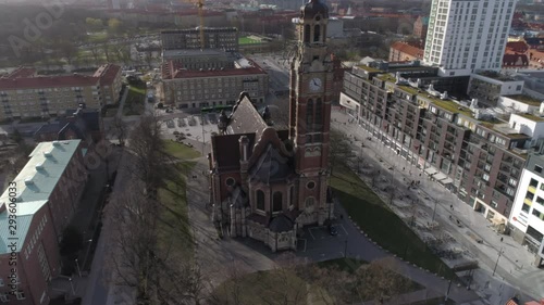 Church in Malmö city, Sweden aerial view. Drone shot flying around church building in Triangeln district photo