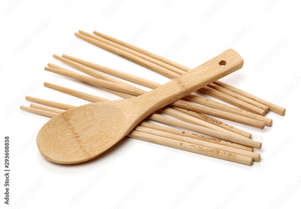 Goji berrBamboo tableware on white backgroundy isolated on white background Goji berrBamboo tableware on white backgroundy isolated on white background