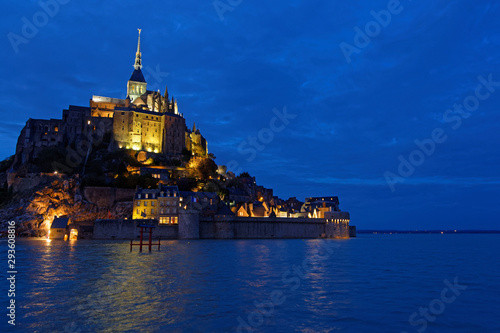 Blue hour on the abbey. One of most recognisable french landmarks, visited by 3 million people a year, Mont Saint-Michel and its bay are on the list of World Heritage Sites.