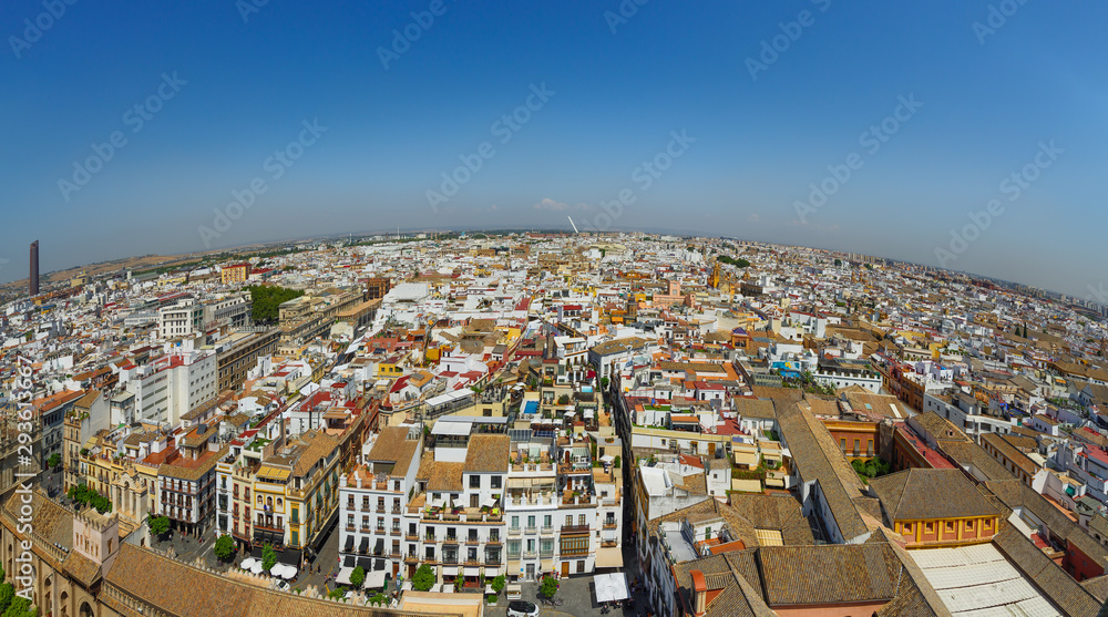 Panoramic view of Seville from the height of the Giralda tower of Cathedral on a sunny day.