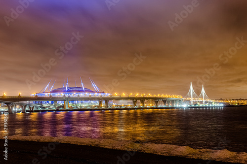 St. Petersburg morning day evening night sunset dawn during the Zenith Arena in the fog and clouds reflected in the sky photo