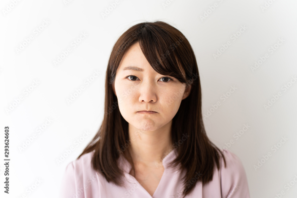 Angry business woman against white background Angry business woman against white background