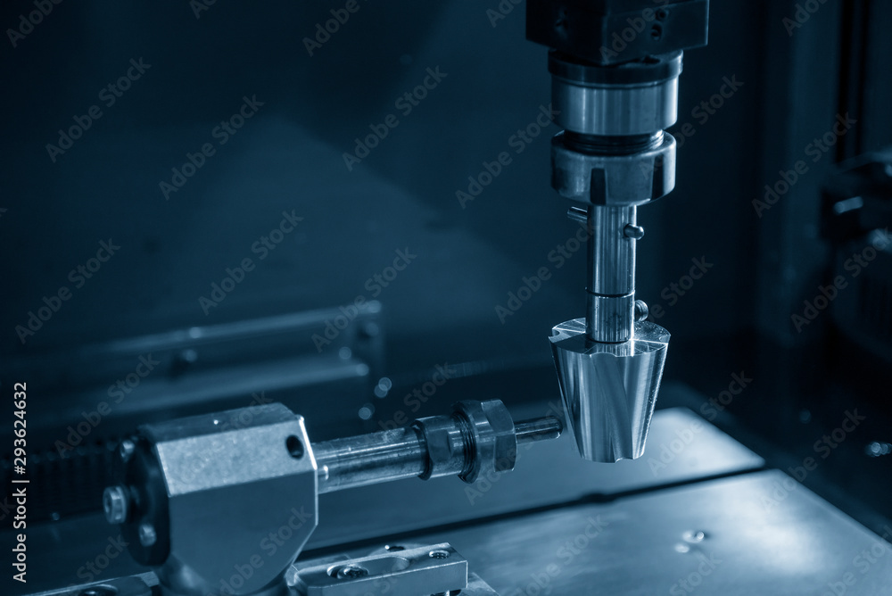 The sinker EDM machine simulation operation with the sample parts. The mould and die manufacturing process by Electrode Discharge Machine with the copper material electrode. The sinker EDM machine simulation operation with the sample parts. The mould and die manufacturing process by Electrode Discharge Machine with the copper material electrode.