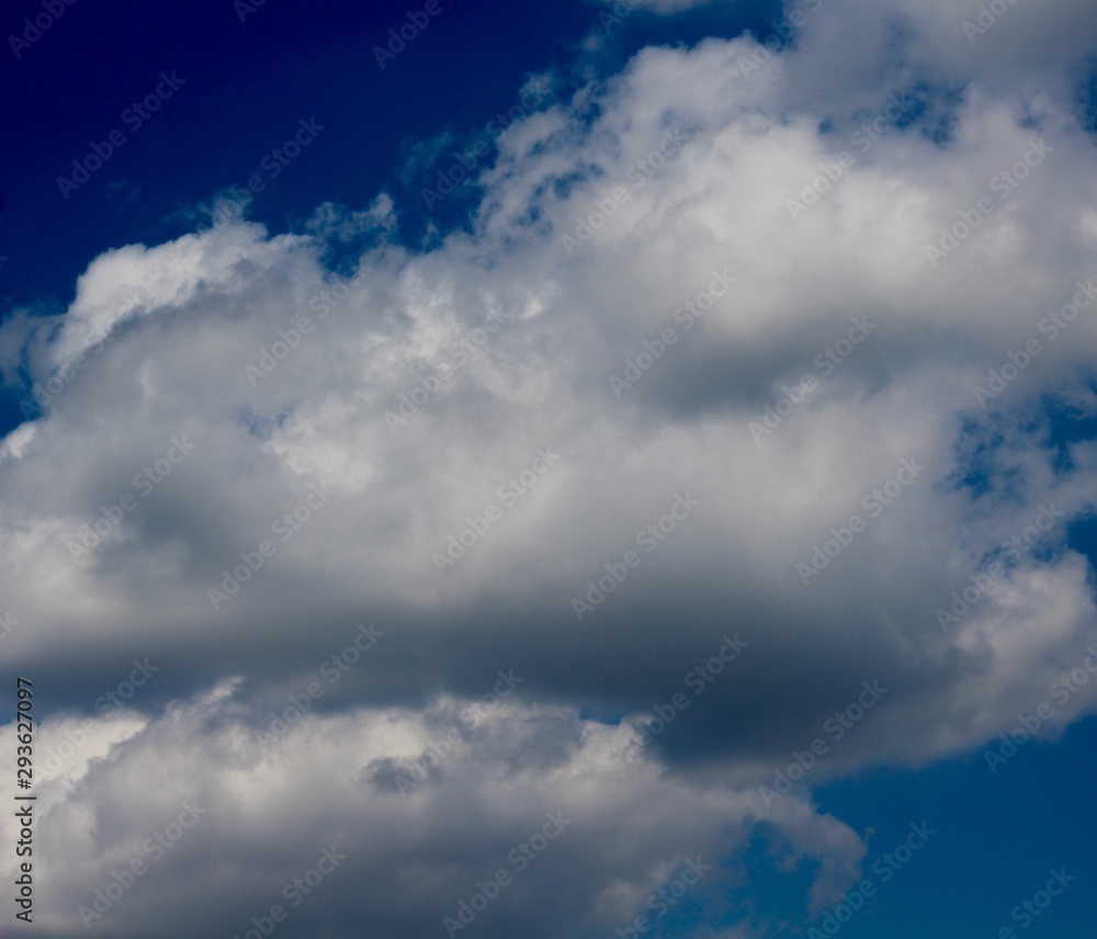 The big fluffy cloud in the blue sky. The big fluffy cloud in the blue sky.