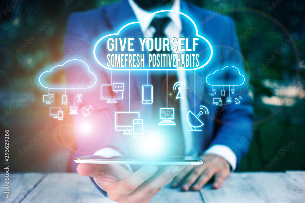 Fototapeta premium Conceptual hand writing showing Give Yourself Some Fresh Positive Habits. Concept meaning Get healthy positive routines Male wear formal work suit presenting presentation smart device