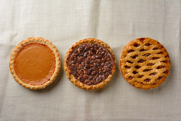 Overhead still life of fresh baked holiday pies