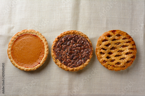 Overhead still life of fresh baked holiday pies photo