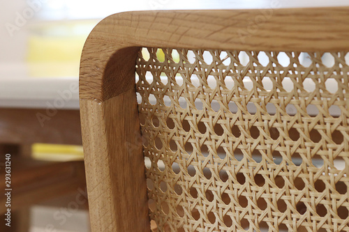 Closeup of wood chair with rattan, Beautiful  oak wood texture surface , rattan pattern.