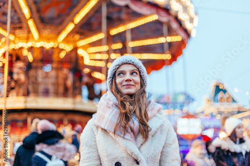 Girl walking on Christmas Market on Red Square in Moscow © Alena Ozerova