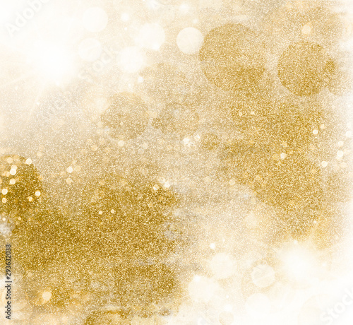 Golden glittering pattern. Festive background of shiny shimmering sparkles