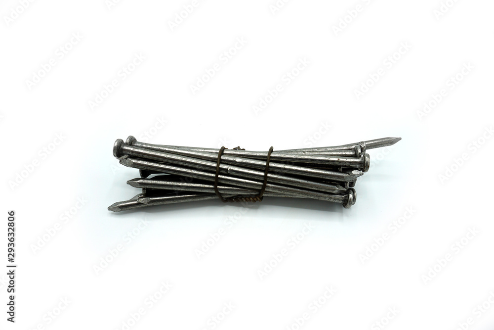 Steel construction nails of different lengths tied together in groups. Steel construction nails of different lengths tied together in groups.
