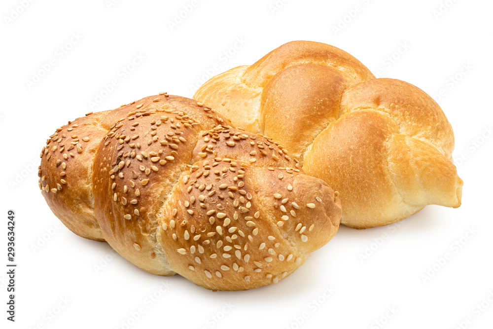 Two plaited white bread rolls isolated on white. Plain and with sesame seeds. Two plaited white bread rolls isolated on white. Plain and with sesame seeds.
