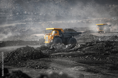 Fototapeta Open pit mine industry, big yellow mining truck for coal anthracite