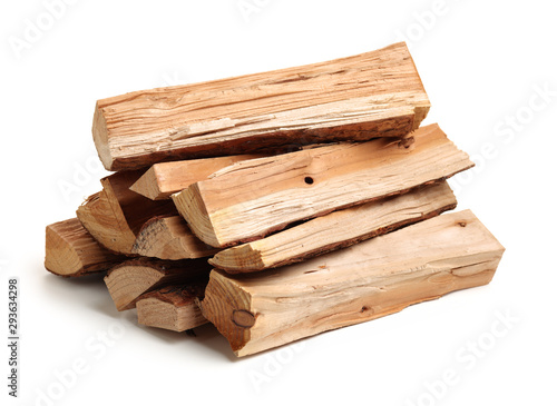 Foto Pile of firewood isolated on a white background
