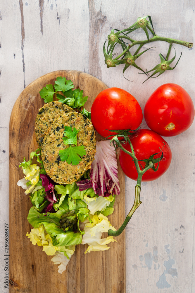 Vegetarian food Wheat Gluten Steaks with spinach Vegetarian food Wheat Gluten Steaks with spinach
