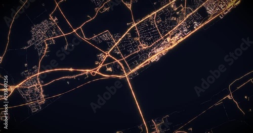 Aerial night view of city of Kingston upon Hull, UK. Traffic and street light glowing. Camera flying high above, moving around city from space filming cinematic straight down. 3d animation rendering. photo