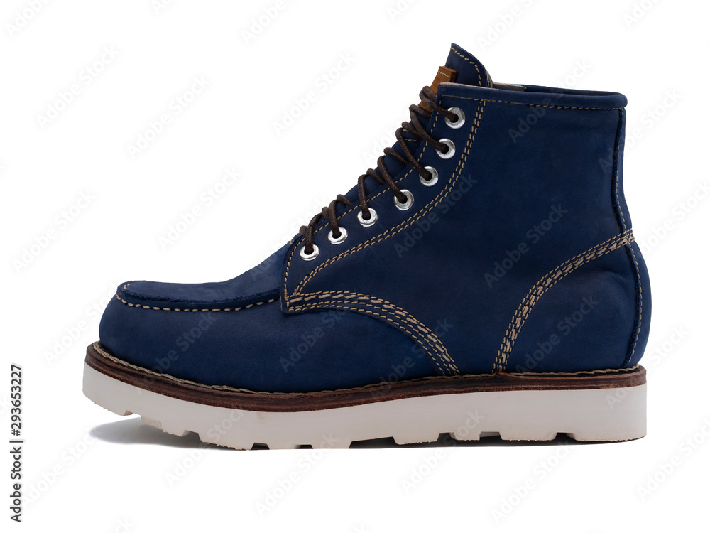Men fashion navy boot with nubuck leather isolated on white background. Side view Men fashion navy boot with nubuck leather isolated on white background. Side view