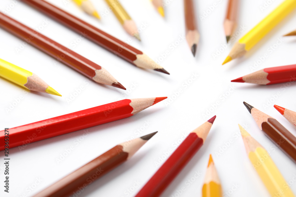 Composition with color pencils on white background Composition with color pencils on white background