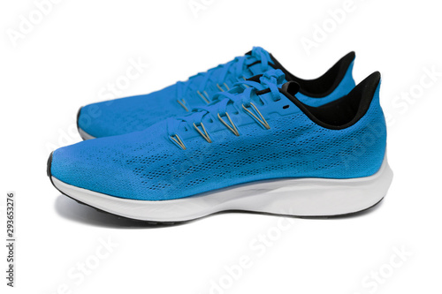 isolated side view of blue running shoes