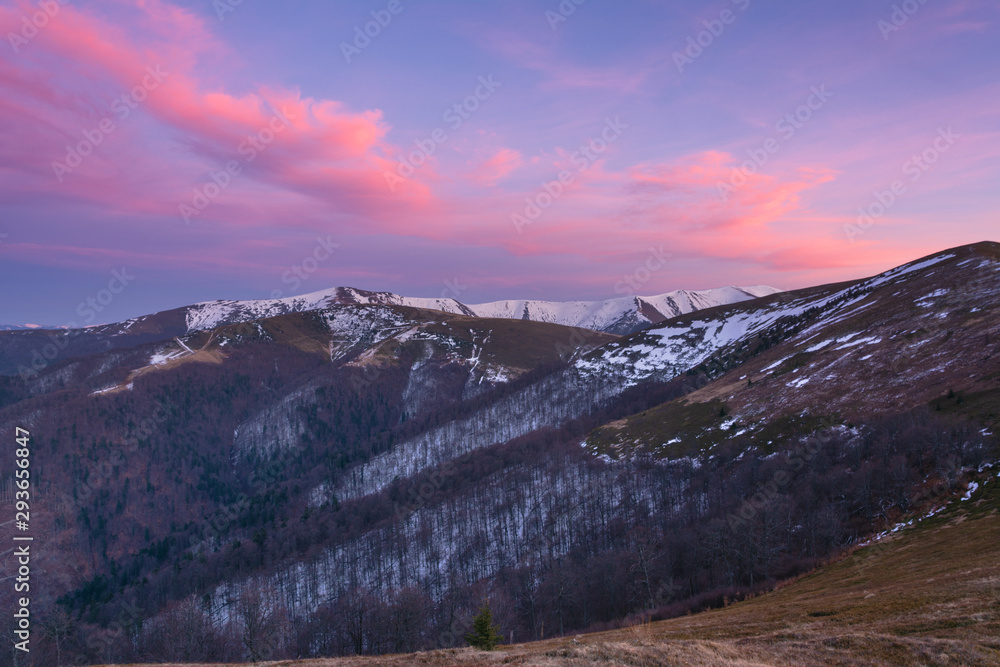Fantastic views of the evening and morning mountain ridge with tourists and tents Fantastic views of the evening and morning mountain ridge with tourists and tents