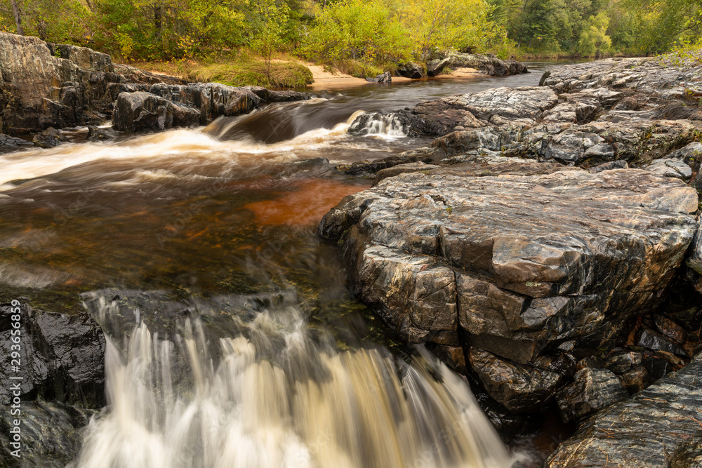 Eau Claire River Waterfall In Autumn Eau Claire River Waterfall In Autumn