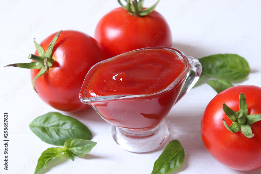 ketchup on the table. Tomato sauce, fresh tomatoes, spices. ketchup on the table. Tomato sauce, fresh tomatoes, spices.