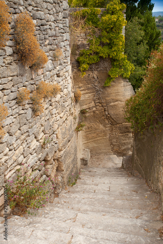 Fototapeta Naklejka Na Ścianę i Meble -   Medieval alley in the old town of Bonnieux, Vaucluse department, Provence-Alpes-Côte d'Azur region, France, Europe