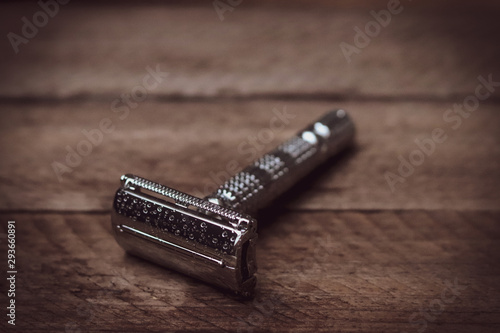 environmentally friendly shaver without plastic on a wooden background