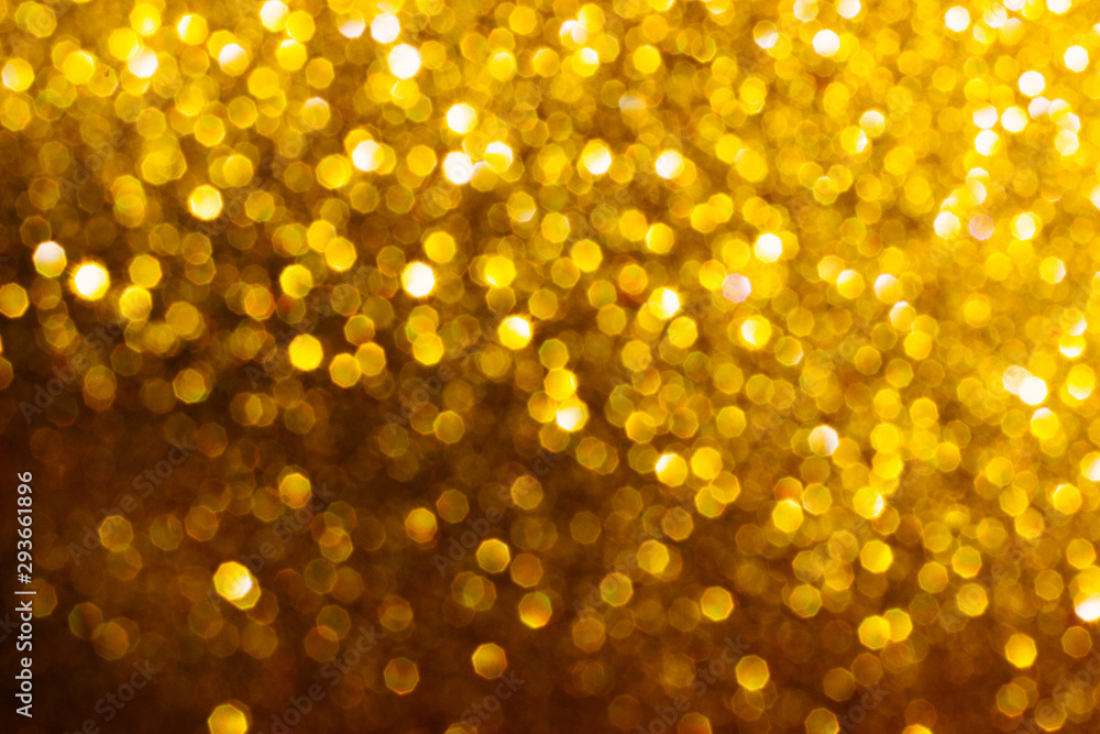Defocused Golden shiny abstract background.