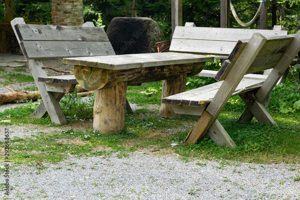 Picnic area in the forest, peaceful place for relaxing in the nature Picnic area in the forest, peaceful place for relaxing in the nature