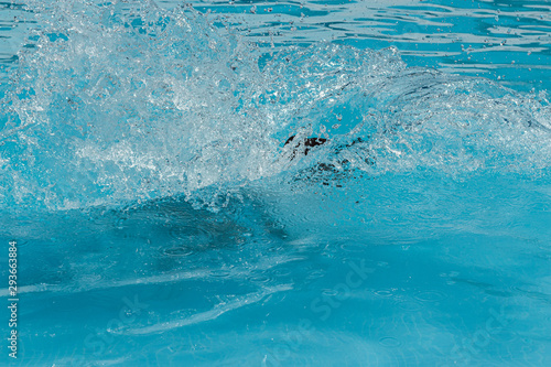 splashing in a swimming pool, enjoying, Portugal © Luis