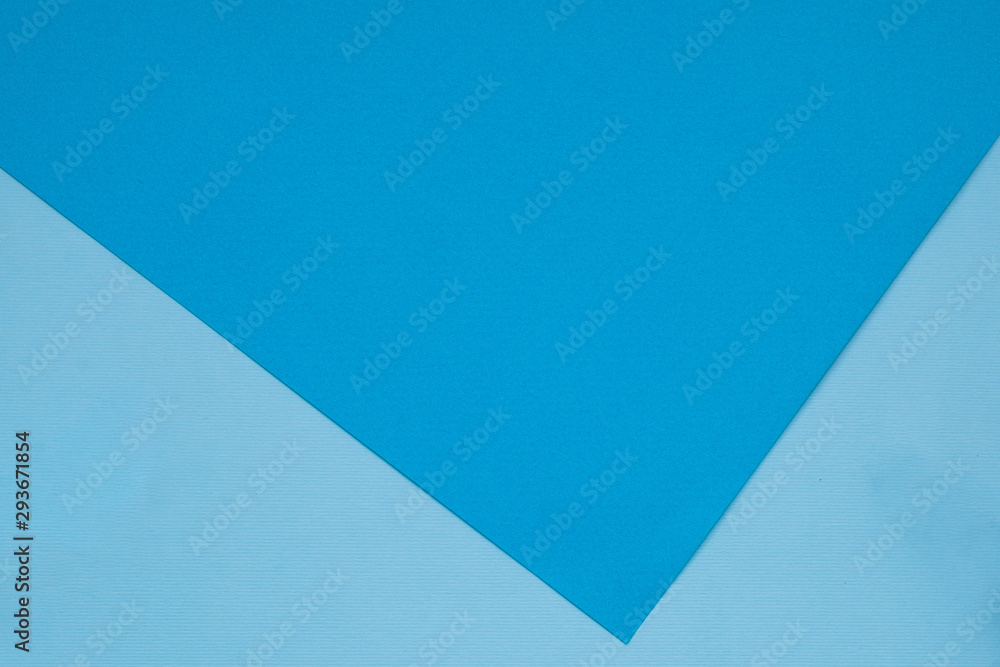 Color papers geometry flat composition background with blue tones