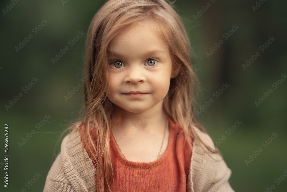 portrait of blonde girl with blue eyes looking at the camera portrait of blonde girl with blue eyes looking at the camera