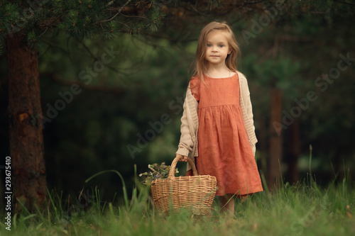 girl with a basket of apples