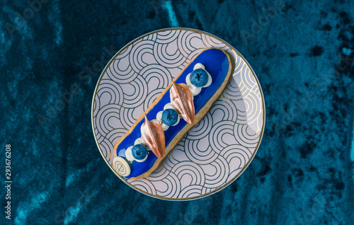 Traditional  French Artisan  design delicious Eclair, sweet and colorful dessert, Patisserie Bakery Product. © Liran
