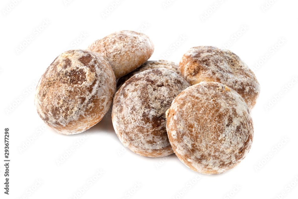 Gingerbread cookies on a white background. Homemade gingerbread cookies close-up. Gingerbread cookies on a white background. Homemade gingerbread cookies close-up.
