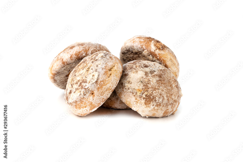 Gingerbread cookies on a white background. Homemade gingerbread cookies close-up. Gingerbread cookies on a white background. Homemade gingerbread cookies close-up.