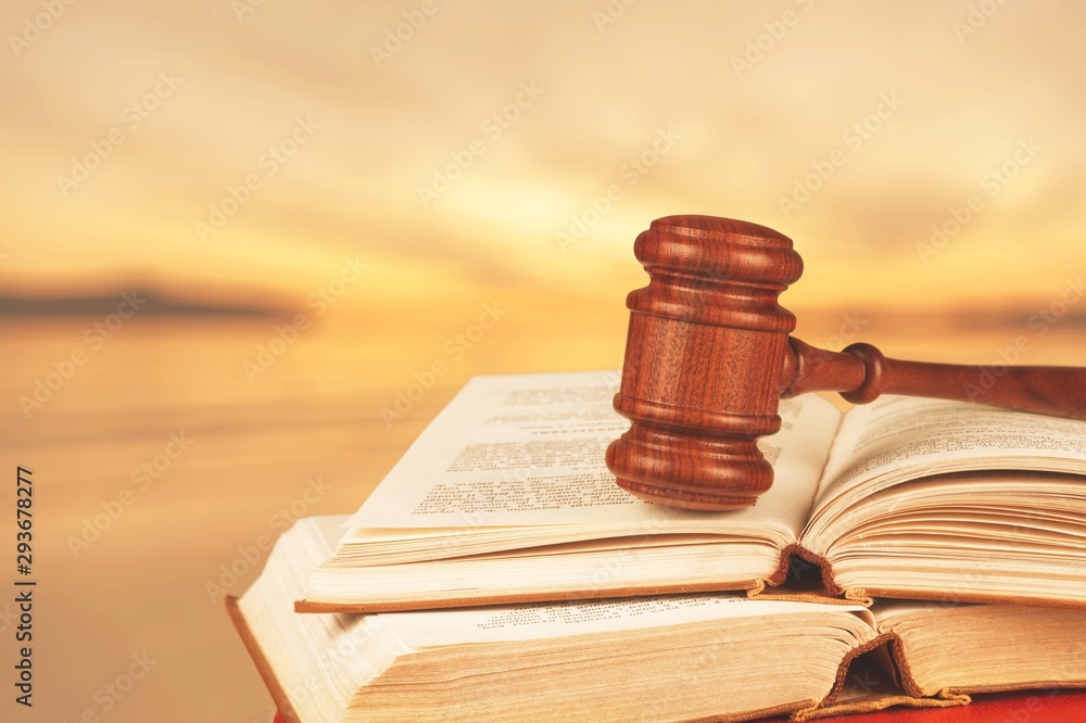 Wooden judge hammer with copyspace over background. Justice and law concept Wooden judge hammer with copyspace over background. Justice and law concept