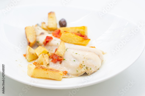 fish with potatoes, baked sea bream