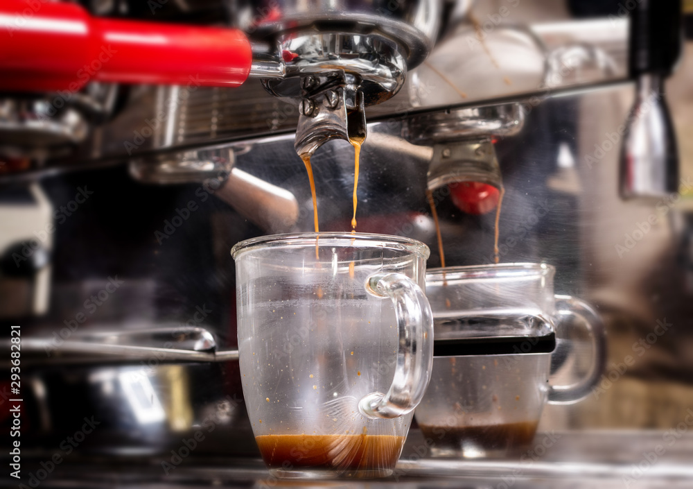 Making espresso coffee in coffeeshop or cafe closeup Making espresso coffee in coffeeshop or cafe closeup