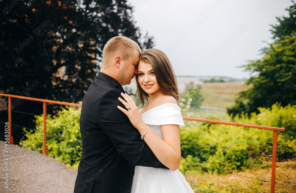 Fototapeta premium Beautiful couple hugging each others