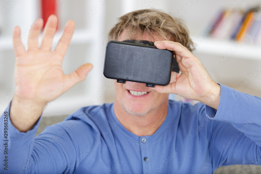 man interacting with virtual reality man interacting with virtual reality
