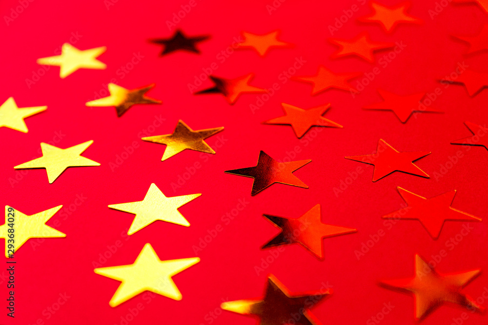 Bunch of gold stars on red background. Bunch of gold stars on red background.